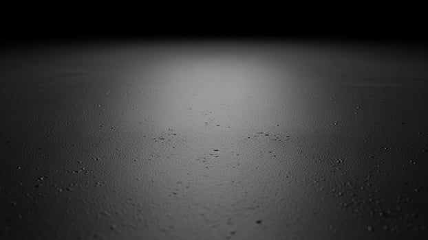 Black and white photo of a dark surface