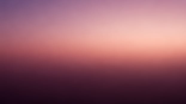 A blurry image of a sunset with a purple sky photo