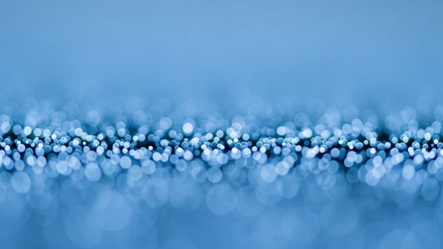 Blue bokeh abstract background with blurred light photo