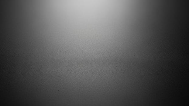 Black and white photo of a dark background