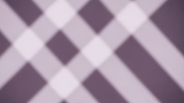A purple and white background with diagonal lines photo
