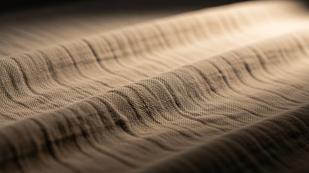 A close up of a fabric with a light shining on it photo