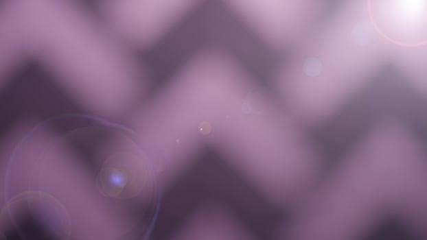 A purple background with a chevron pattern photo