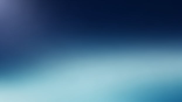 Blue and white blurred background with a light source photo