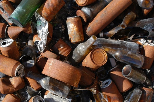 rusty cans on glass bottles backdrop photo