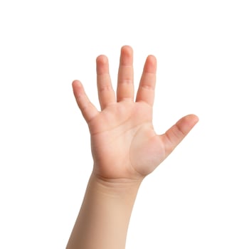 Child hand open palm showing five fingers isolated on white background studio shot photo