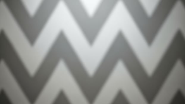 a gr a y a nd white chevron p a ttern w a llp a per photo
