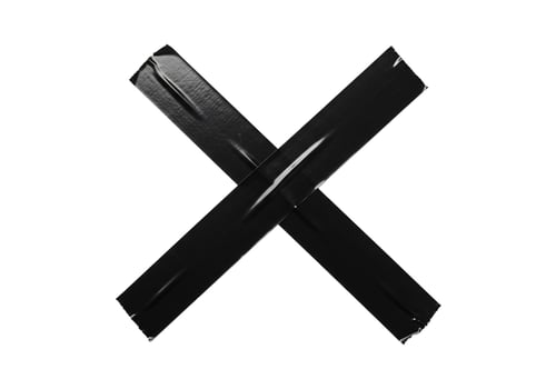 Black duct tape cross isolated on white background industrial material photo
