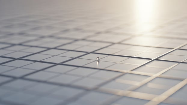 A small object on a grid of squares photo