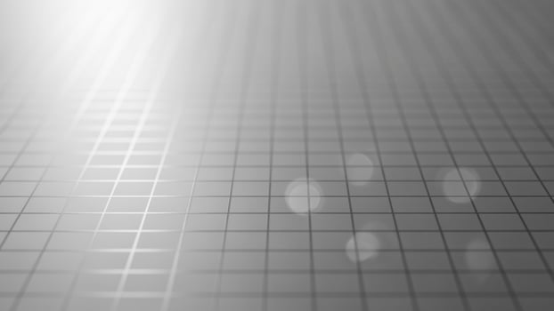 A grid background with a light source photo