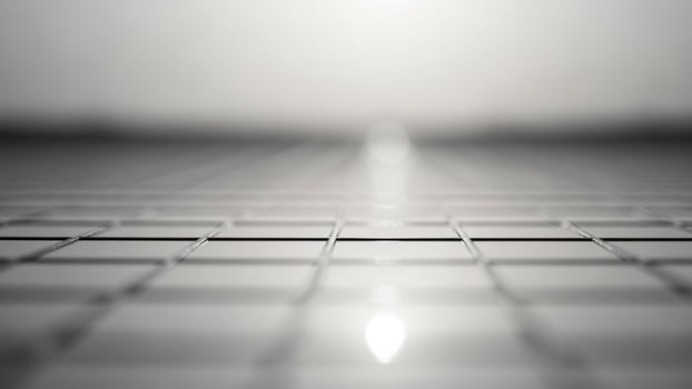 A black and white photo of a tiled floor
