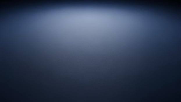 A dark backgroundlue backgroundackground with a light shining on it photo