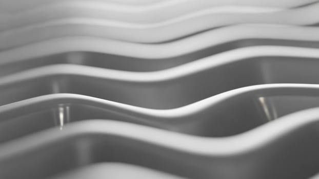 A black and white photo of a wave pattern