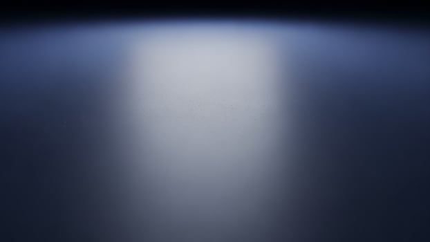 A dark room with a light shining through it photo