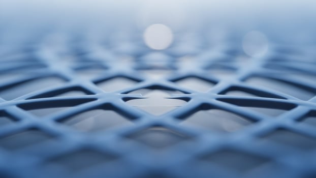 Abstract blue background with a grid of holes photo