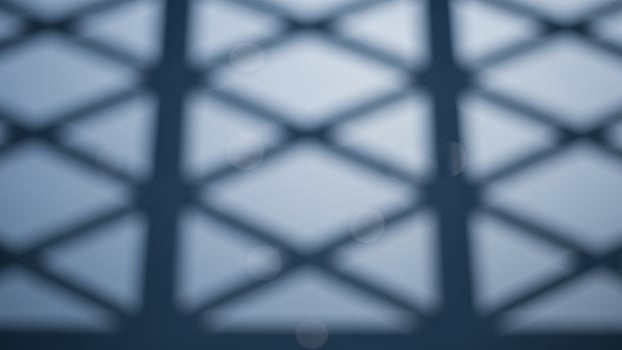 A window with a lattice pattern in the background photo