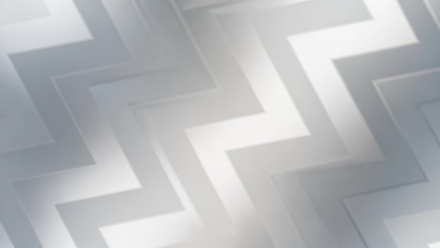 A silver and white background with a zigzag pattern photo