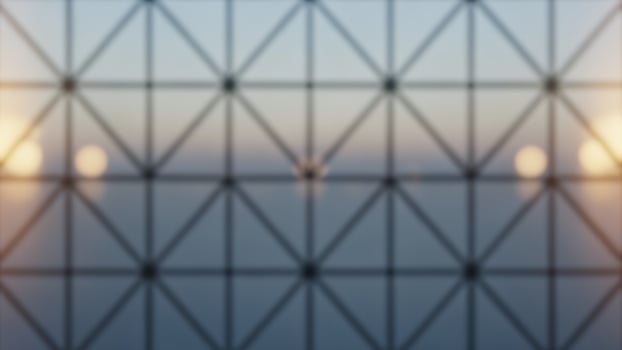 A blurred image of a window with a light shining through it photo