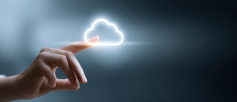 The Hand Touching a Glowing Digital Cloud Icon photo