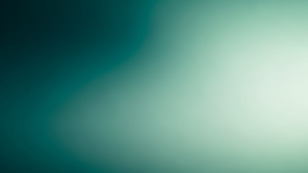A green and blue background with a blurry image photo