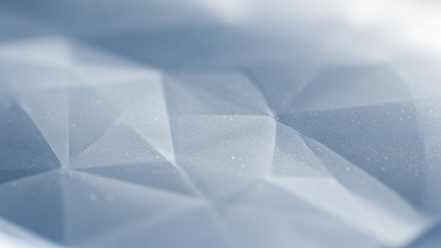 A blue and white abstract background with a lot of small triangles photo