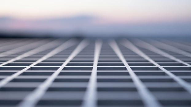 A close up of a grid of squares on a metal floor photo