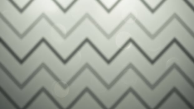 A photo of a chevron pattern on a glass window