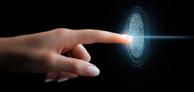 The Hand Engaging with a Digital Fingerprint Representation on Screen photo