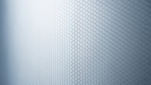A close up of a metal surface with a pattern background. photo