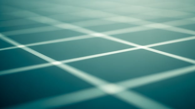 A close up of a grid of squares on a blue background photo