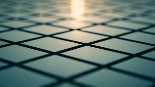A close up of a tiled floor with the sun shining through photo