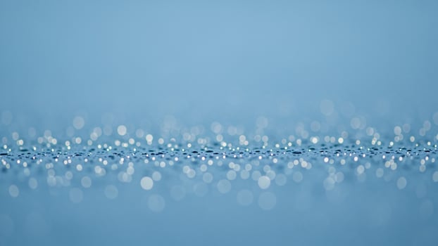 Water droplets on a blue background background. photo