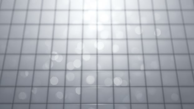 A gray wall with a light shining through it photo