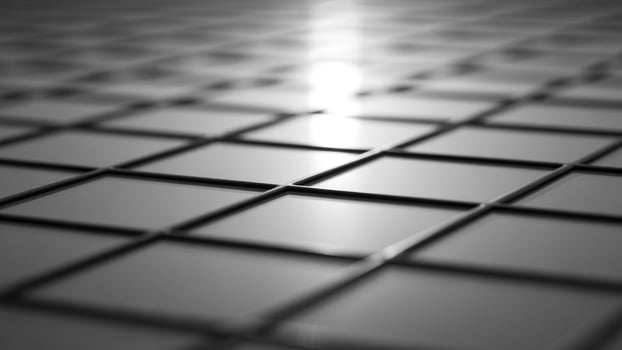 A black and white photo of a shiny metal surface