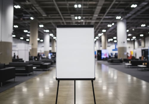 Blank presentation board in exhibition hall ready for display photo