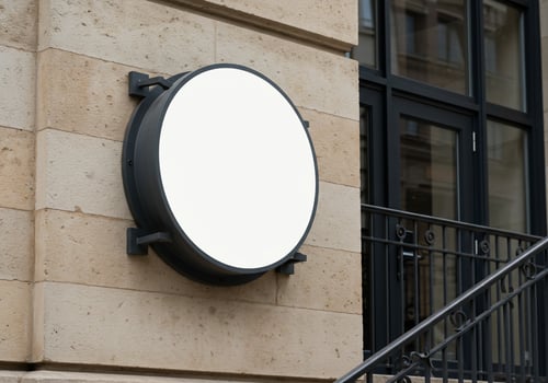 Blank round sign on textured wall for branding advertisement mockup photo