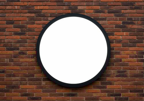 Circular frame with white center on brick wall background texture with copy space photo