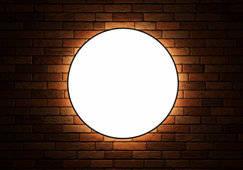 White circle frame on brown brick wall background photo