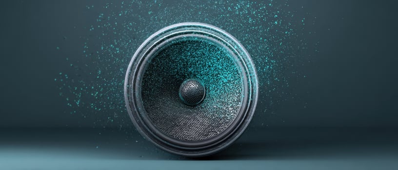 The captivating speaker surrounded by vibrant particles in a dynamic setting. photo
