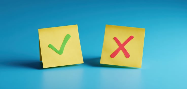 The colorful sticky notes with checkmark and cross symbols against a blue background. photo