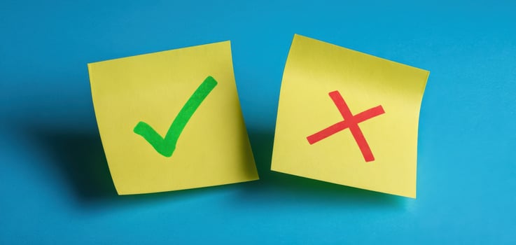 The colorful sticky notes featuring a checkmark and a cross on a blue background. photo
