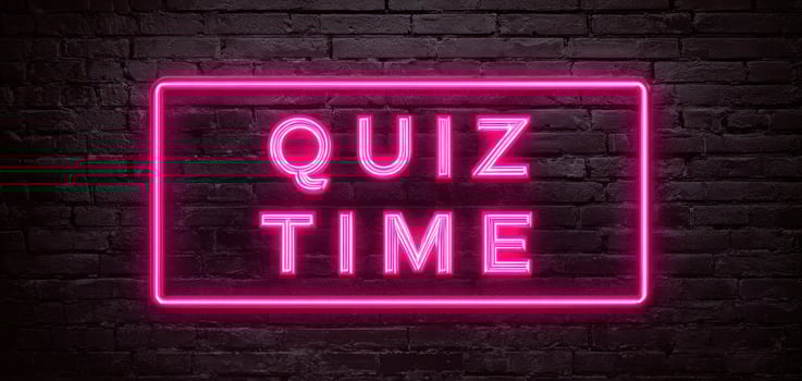 The Neon Sign Illuminating Quiz Time for a Fun Atmosphere photo