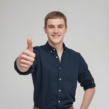 A man in a blue shirt is giving the thumbs up photo
