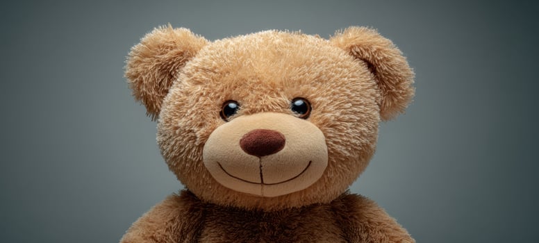 The adorable teddy bear radiates warmth and joy in a soft, plush form. photo