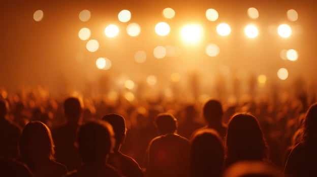 The vibrant crowd enjoying a live music performance under dazzling lights. photo