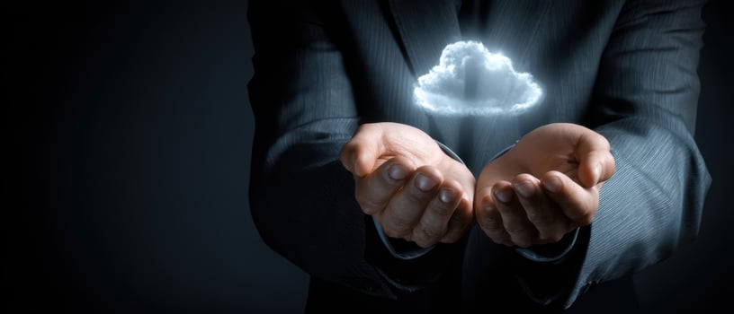 The Hands Holding a Cloud Representing Innovative Technology Solutions photo