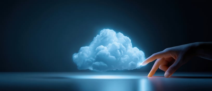 The hand reaching towards a glowing cloud in a dark environment. photo