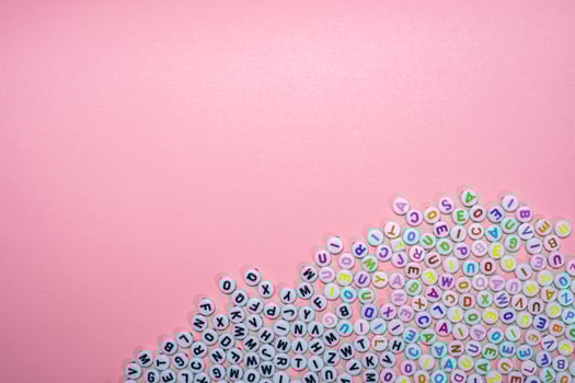 Fun Multicolored Alphabet Spread on White photo