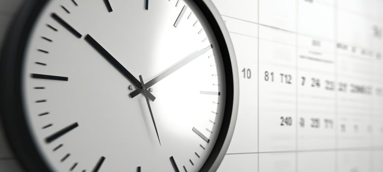 The Modern Clock Displaying Time Against a Wall Calendar Background photo