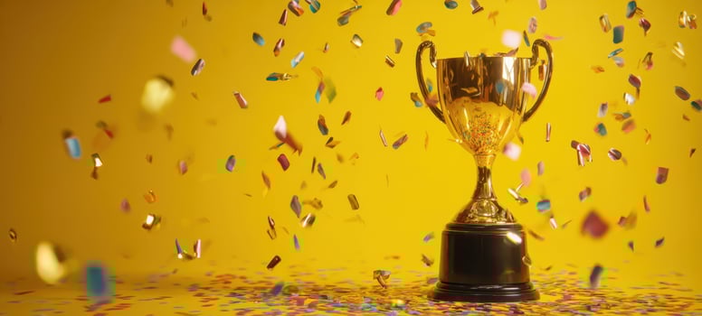 The sparkling trophy surrounded by colorful confetti celebrating a moment of victory. photo